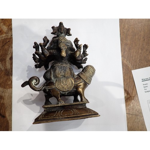 478 - An Eastern bronze Figure of Ganesh, seated on a large Indian bandicoot, 7in H and an Eastern bronze ... 