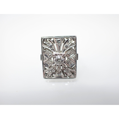 167 - An Art Deco style Cocktail Ring the rectangular openwork plaque millegrain-set principle old-cut sto... 