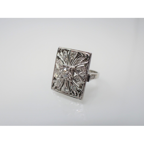 167 - An Art Deco style Cocktail Ring the rectangular openwork plaque millegrain-set principle old-cut sto... 