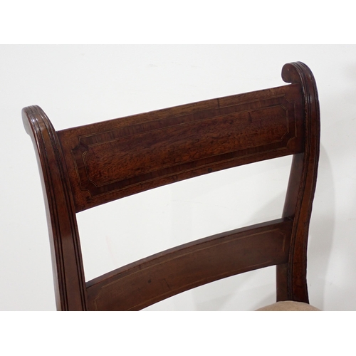 25 - A set of four 19th Century mahogany and crossbanded bar-back Dining Chairs on turned front supports