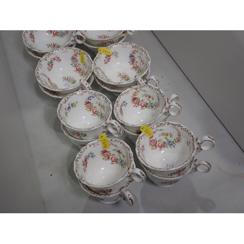 250 - A Coalport painted part Tea and Coffee Service, with Adelaide shaped cups, decorated floral wreaths.... 