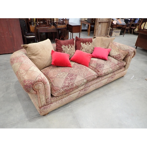 685 - A large burgundy and gold upholstered Chesterfield Sofa  8ft W x 2ft 10in H x 4ft 6in D, various Thr... 