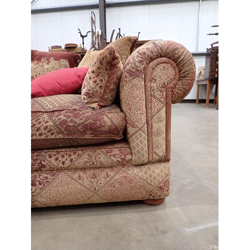 685 - A large burgundy and gold upholstered Chesterfield Sofa  8ft W x 2ft 10in H x 4ft 6in D, various Thr... 