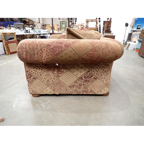 685 - A large burgundy and gold upholstered Chesterfield Sofa  8ft W x 2ft 10in H x 4ft 6in D, various Thr... 