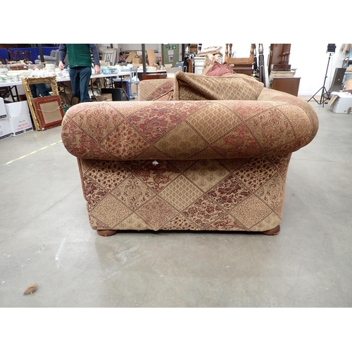 685 - A large burgundy and gold upholstered Chesterfield Sofa  8ft W x 2ft 10in H x 4ft 6in D, various Thr... 