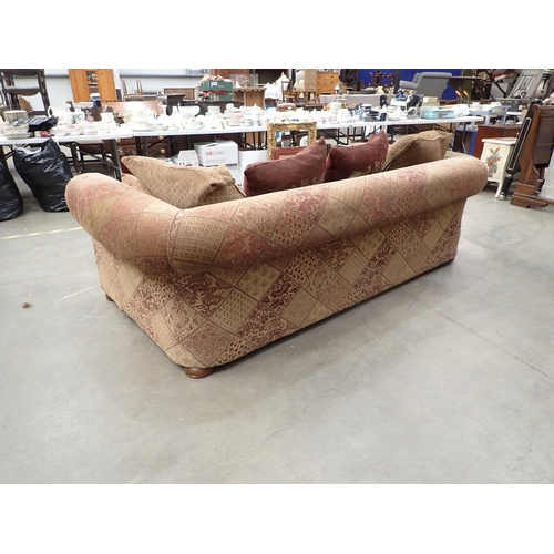 685 - A large burgundy and gold upholstered Chesterfield Sofa  8ft W x 2ft 10in H x 4ft 6in D, various Thr... 