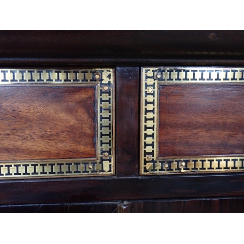 317 - A Regency rosewood Side Cabinet with pair of brass inlaid drawers above a pair of grill panelled doo... 