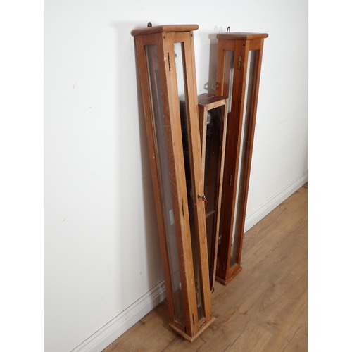 1 - Three Stick Barometers mounted in glazed wooden case