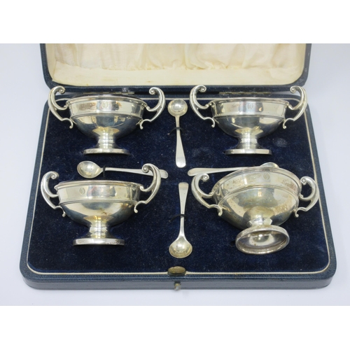 101 - A set of four George V silver two-handled circular pedestal Salts, engraved initial O, Birmingham 19... 