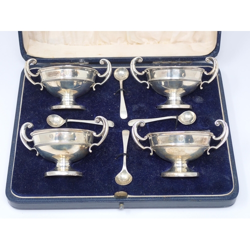 101 - A set of four George V silver two-handled circular pedestal Salts, engraved initial O, Birmingham 19... 