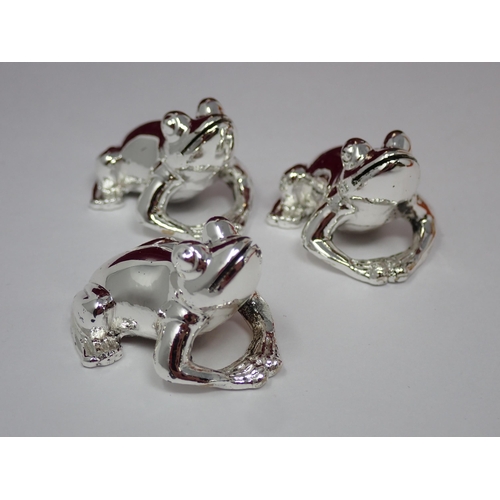 102 - A set of six Saint Hilaire, Paris plated Party Card Holders in the form of frogs, in case, and Aspre... 