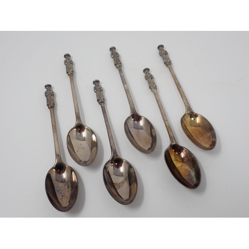 103 - Six Edward VII silver apostle Teaspoons, London 1907, by Mappin & Webb, in case, and a Bottle Stoppe... 