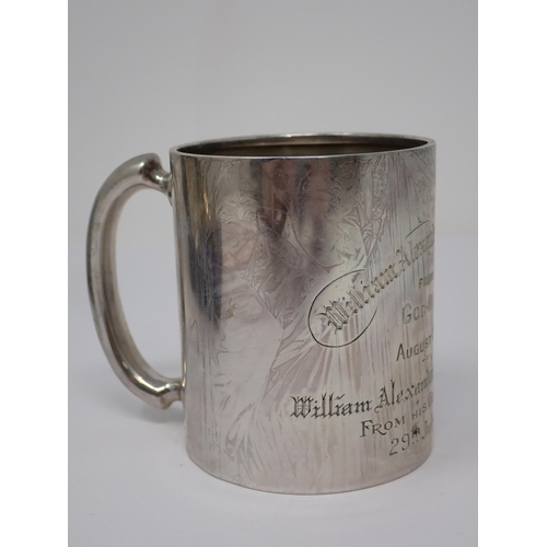 105 - A sterling silver Christening Mug with inscription, marked BIRKS, and a silver Egg Cup and Spoon, Bi... 