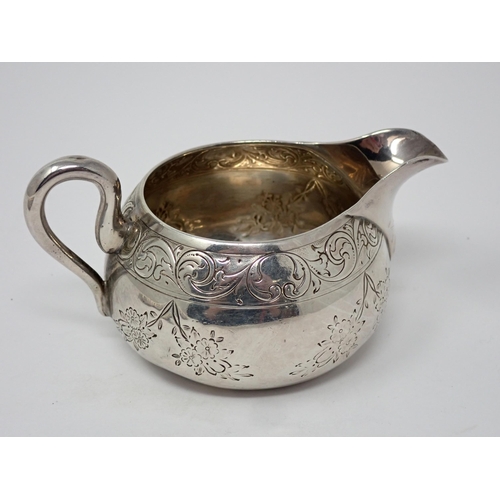 107 - A George V silver shaped circular Waiter with leafage engraved frieze, initial 'O', etc, Birmingham ... 