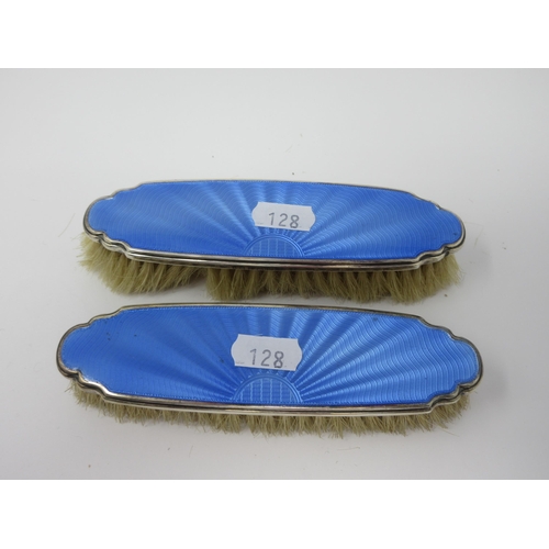 128 - A pair of Edward VIII silver and blue basse taille enamel mounted Brushes, Birmingham 1936, and a ma... 