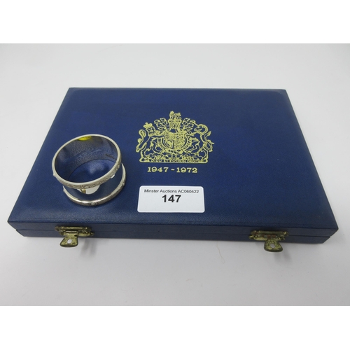 147 - Six Elizabeth II silver Royal Spoons with portrait finials, London 1972, in case, and a Napkin Ring,... 