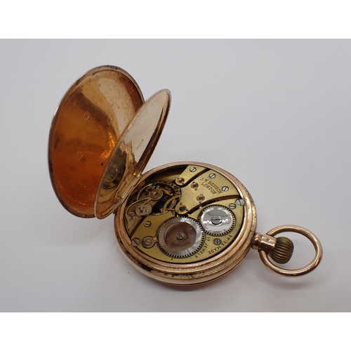 153 - A 9ct gold cased keyless wind half hunter Pocket Watch by J W Benson. London in Dennison case, the w... 