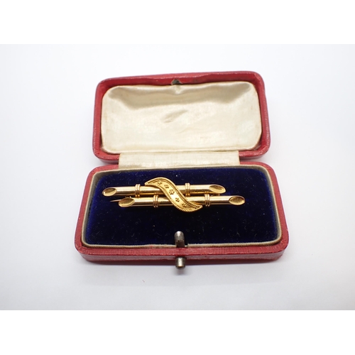 175 - A gold bamboo effect Bar brooch, stamped 18ct, 45mm wide, approx 4.95gms