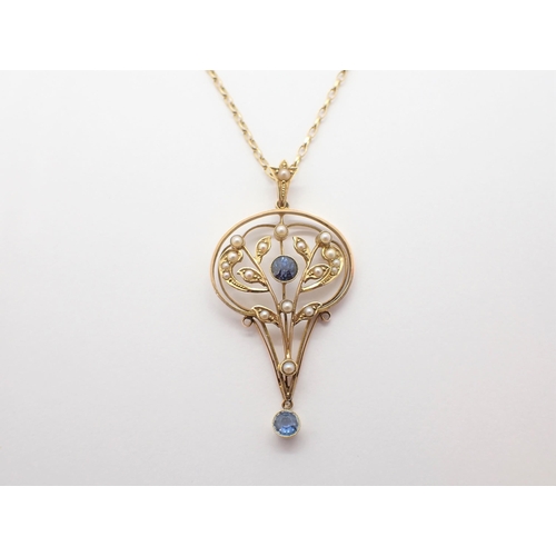 200 - ** WITHDRAWN ** An Edwardian Pendant the openwork plaque set seed pearls with round blue stones to c... 