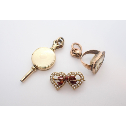 201 - ** WITHDRAWN ** A Seed Pearl and Enamel interlocking heart Brooch in 9ct gold, an Intaglio Seal Fob ... 