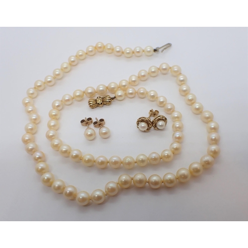 203 - ** WITHDRAWN ** A single row of Cultured Pearls on 9ct gold bow shaped clasp and two pairs of Cultur... 