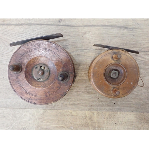 31 - Two antique wooden Fishing Reels and a cane Rod A/F