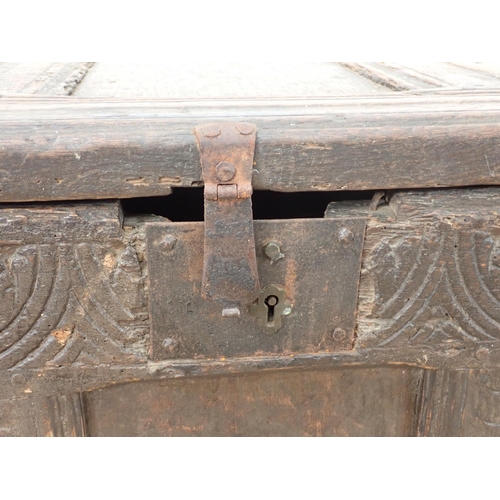 324 - A 17th Century oak Coffer with panelled top and lozenge carved three panelled front, 3ft 5in W