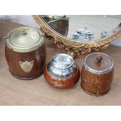 330 - A small oak dropleaf Table, a circular gilt Wall Mirror and three oak Biscuit Barrels