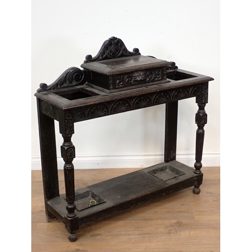 340 - A Victorian ebonised and carved Stick/Umbrella Stand, 3ft W x 3ft H