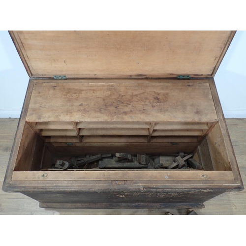 347 - A stained wood Carpenter's Chest, fitted and containing carpenter's tools, 3ft 3in W