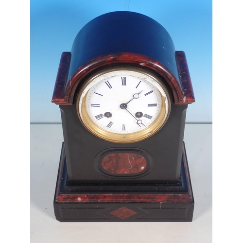 353 - A veined and black marble Mantel Clock with circular dial, 10 1/2in H