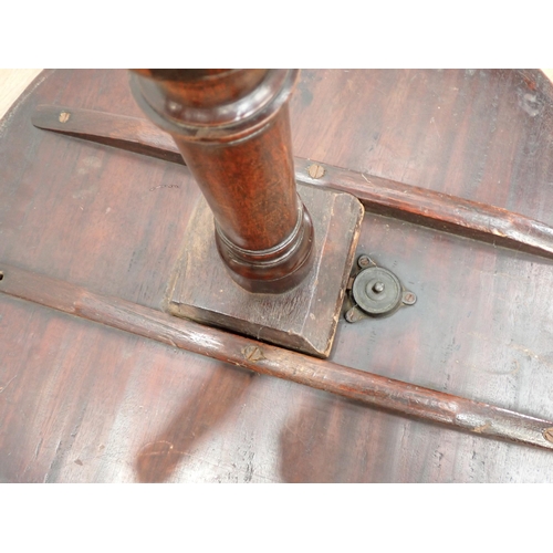 355 - A 19th Century mahogany tilt top Table with turned column and tripod base, 1ft 9in diam A/F