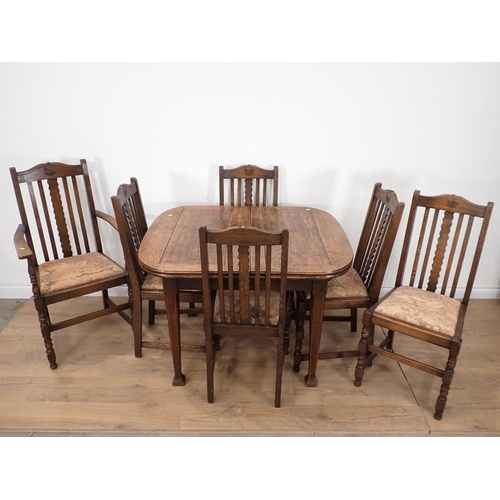 356 - An oak Drawleaf Dining Table and six Chairs and an oak veneered Bedroom pair