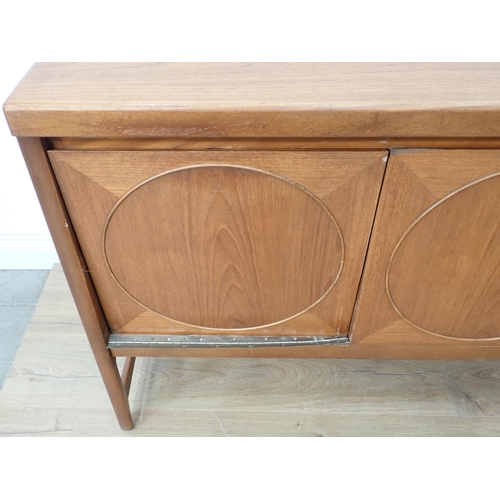 36 - A 1960's Nathan 'Circles' teak Sideboard fitted three cupboard doors (one A/F) and three drawers 6ft... 