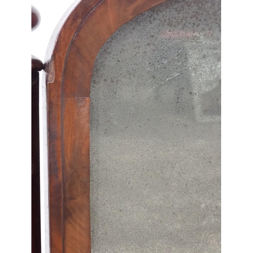 374 - A Victorian mahogany Dressing Mirror with arched plate (plate A/F), supported on octagonal tapering ... 