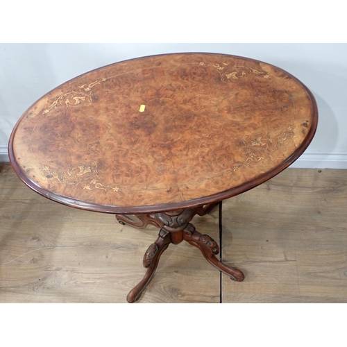 379 - A Victorian burr walnut and marquetry inlaid Occasional Table with oval top on carved and turned sup... 