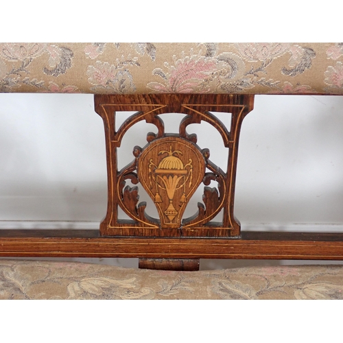 384 - An Edwardian rosewood and marquetry inlaid Settee with upholstered back and seat on turned front sup... 