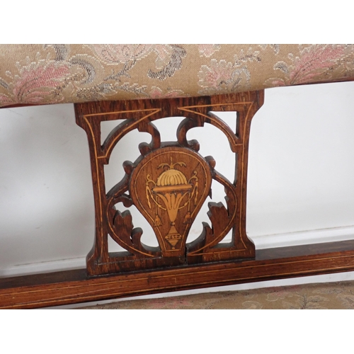 384 - An Edwardian rosewood and marquetry inlaid Settee with upholstered back and seat on turned front sup... 