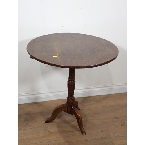 385 - A 19th Century oak Pillar Table with turned column and tripod base, 2ft 2in Diam, legs A/F