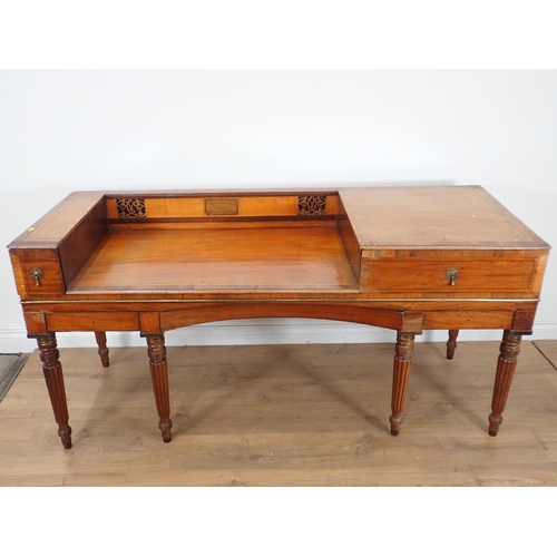 387 - A crossbanded mahogany Desk converted from a square piano fitted drawers on reeded tapering supports... 