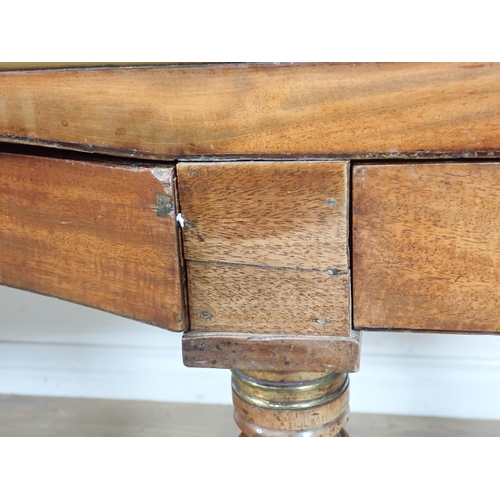 387 - A crossbanded mahogany Desk converted from a square piano fitted drawers on reeded tapering supports... 