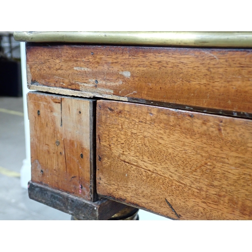 387 - A crossbanded mahogany Desk converted from a square piano fitted drawers on reeded tapering supports... 