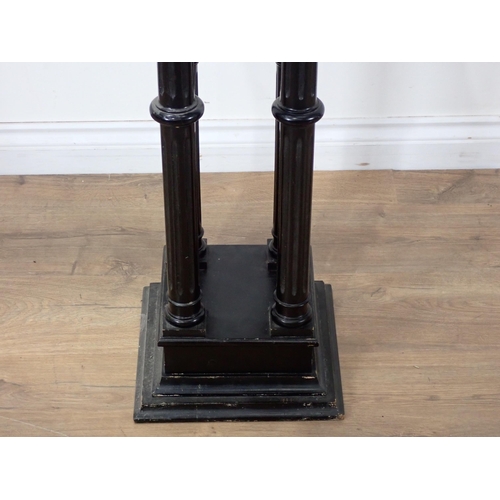 389 - An ebonised Jardiniere Stand with square top and fluted turned supports, 3ft H