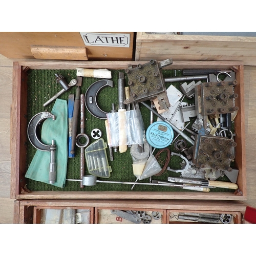 393 - A large quantity of boxes of metalworking equipment including vices, drill bits, drills, planes, nut... 