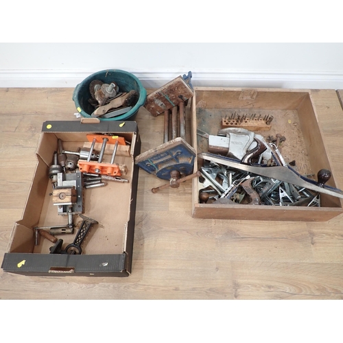 393 - A large quantity of boxes of metalworking equipment including vices, drill bits, drills, planes, nut... 