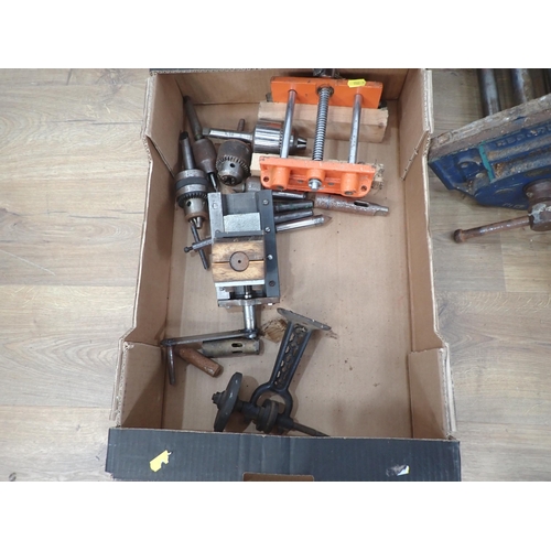 393 - A large quantity of boxes of metalworking equipment including vices, drill bits, drills, planes, nut... 