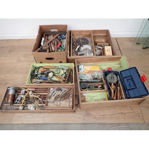 393 - A large quantity of boxes of metalworking equipment including vices, drill bits, drills, planes, nut... 