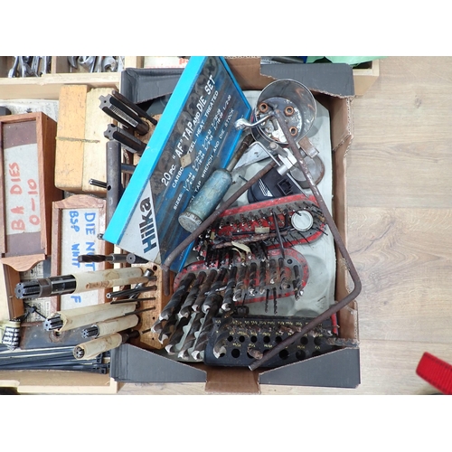 393 - A large quantity of boxes of metalworking equipment including vices, drill bits, drills, planes, nut... 