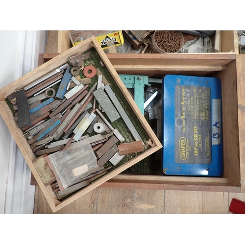 393 - A large quantity of boxes of metalworking equipment including vices, drill bits, drills, planes, nut... 