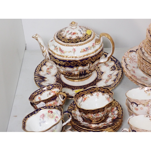 399 - A Crescent China part Tea Set, decorated sprays of flowers with gilt and blue borders and a Stafford... 